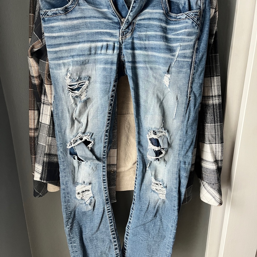 Buckle Black Distressed Blue Denim Jeans